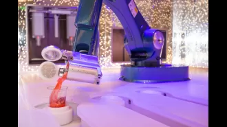 New cruise ship features robot bartenders making 1,000 drinks daily.