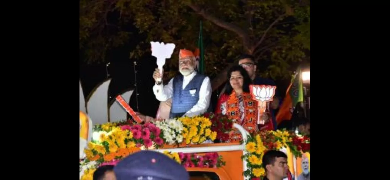 Indian Prime Minister Modi holds parade on streets of Bhubaneswar.