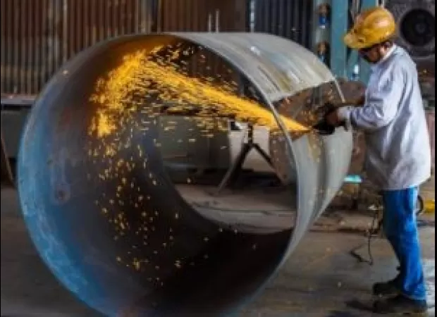 IIP growth in March slows to 4.9%, but still shows a 5.8% increase for the fiscal year according to government data.