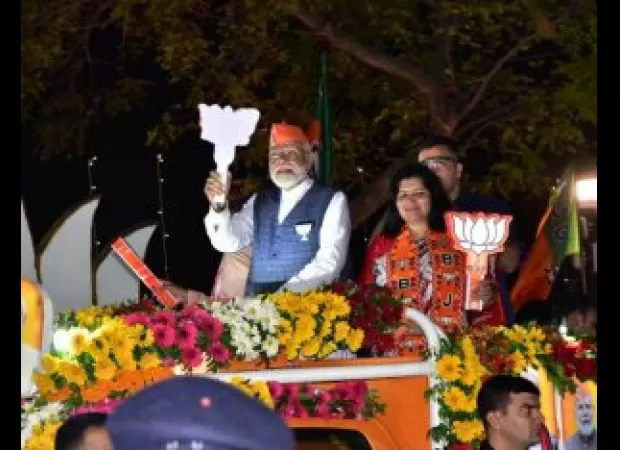 Indian Prime Minister Modi holds parade on streets of Bhubaneswar.