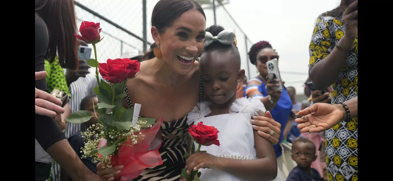 Meghan, also known as 'Ifeoma' in Nigeria, discusses her Nigerian heritage with women.
