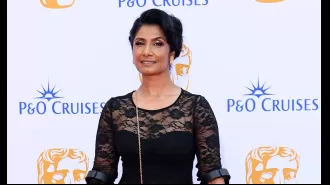 EastEnders star Balvinder Sopal arrives at Baftas with crutches and boot due to injury.