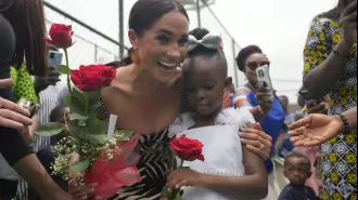 Meghan, known as 'Ifeoma' in Nigeria, discusses her Nigerian heritage with women.