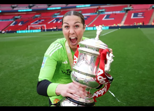 Man Utd coach Marc Skinner pleads with goalie Mary Earps to remain with team following victory in FA Cup final.