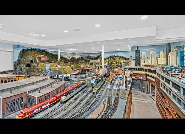 This expensive mansion features a train-themed room.