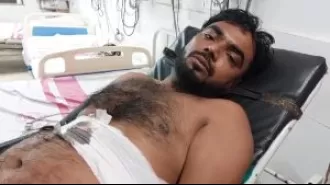 Garage owner stabbed, campaign van driver arrested.