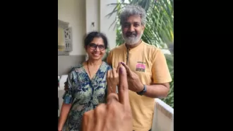 Rajamouli hurries to vote at polling station after arriving from airport.