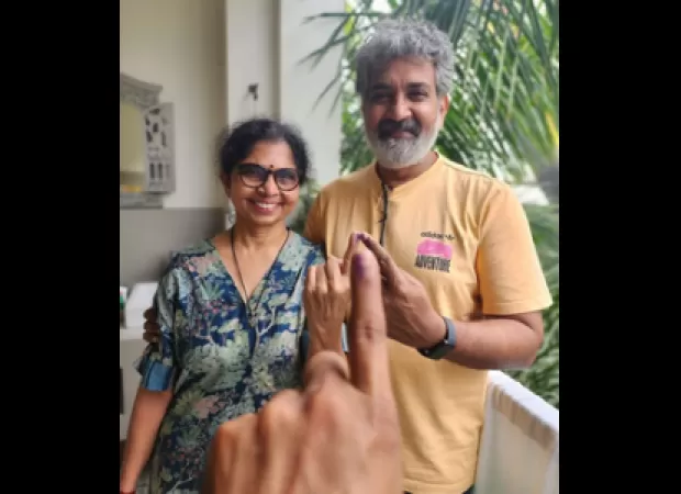 Rajamouli hurries to vote at polling station after arriving from airport.