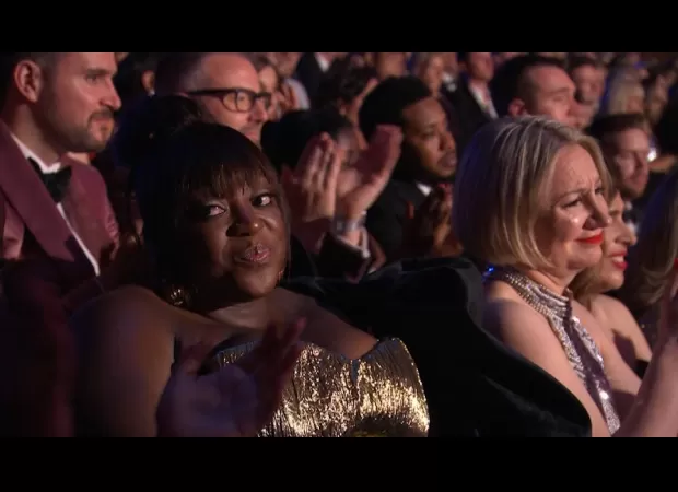 TV personality responds to criticism over fellow celebrity's award win with official statement.