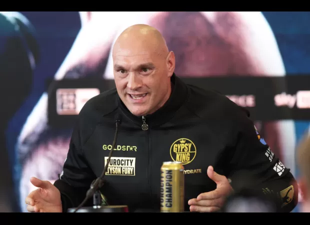 Tyson Fury left media day for Usyk fight on crutches due to unknown reasons.