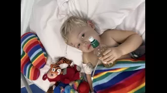 Mom discovered son's cancer by noticing strange detail in vacation picture.