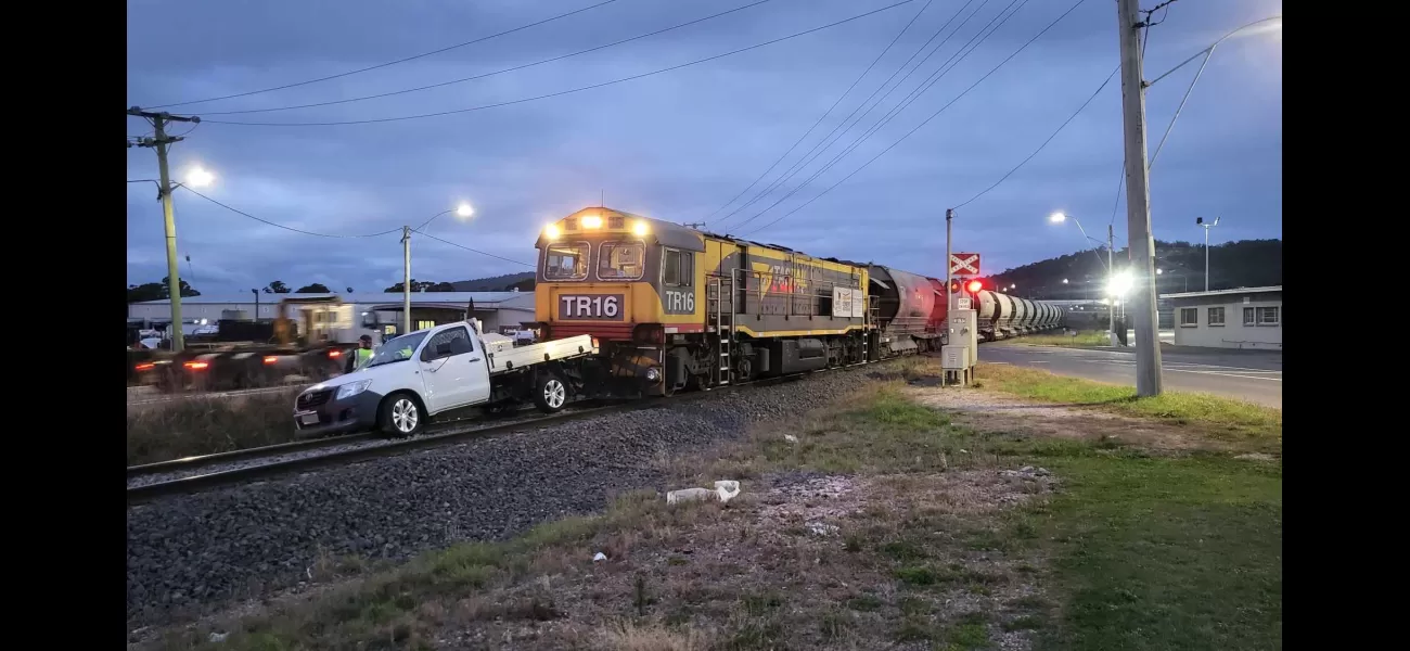 A man narrowly avoids being hit by a train after jumping out of his ute at the last minute.