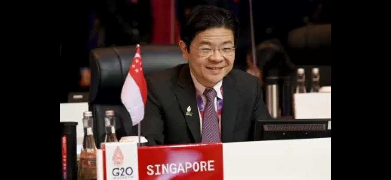 Wong takes office as Singapore's PM.