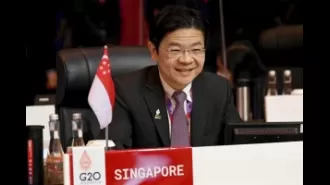 Wong takes office as Singapore's PM.