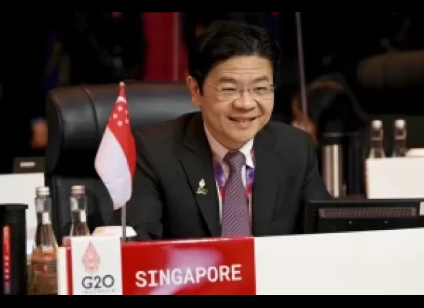 Wong takes office as Singapore's PM.