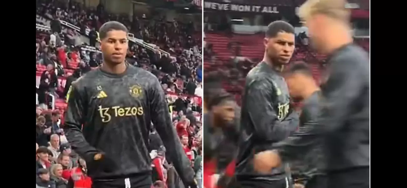 Man Utd player Marcus Rashford gets into an argument with a fan during warm-up before game against Newcastle.