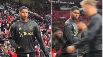 Man Utd player Marcus Rashford gets into an argument with a fan during warm-up before game against Newcastle.