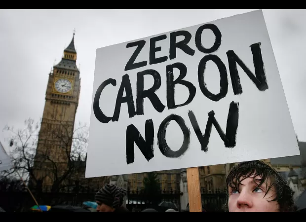 Energy minister advises UK to stop competing for first place in achieving net zero emissions.
