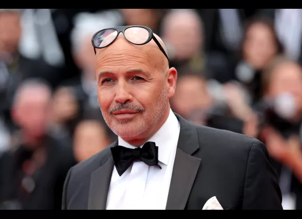 90s movie star shocks fans with dapper transformation at Cannes.