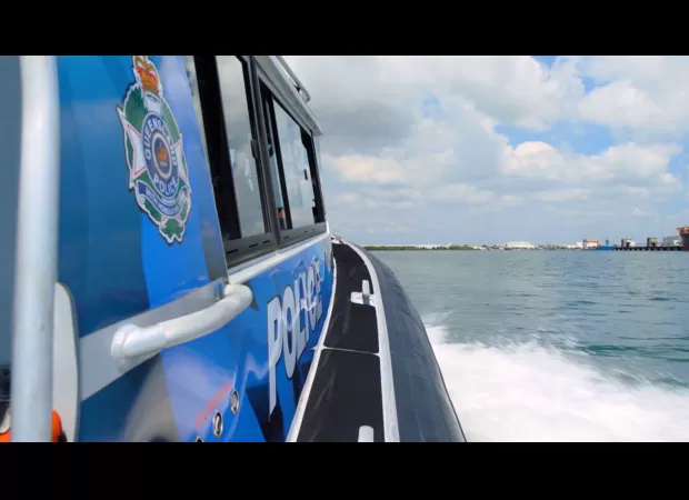 A woman's body was recovered after she went swimming at a popular tourist destination.