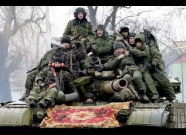 Ukraine's controversial mobilization law takes effect as tensions with Russia intensify, putting strain on front-line soldiers.