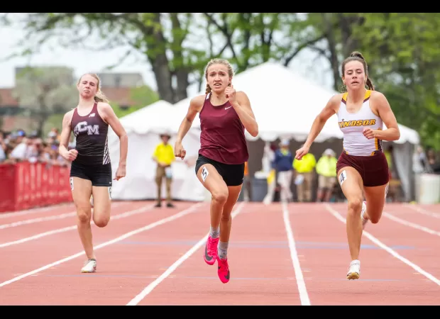 At the state track competition, Windsor's Mikey Munn and Golden's Abigail Trapp dominate the sprints amidst chaotic conditions.