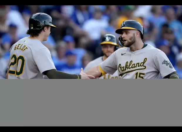The Athletics drop below .500 after losing to the Royals.