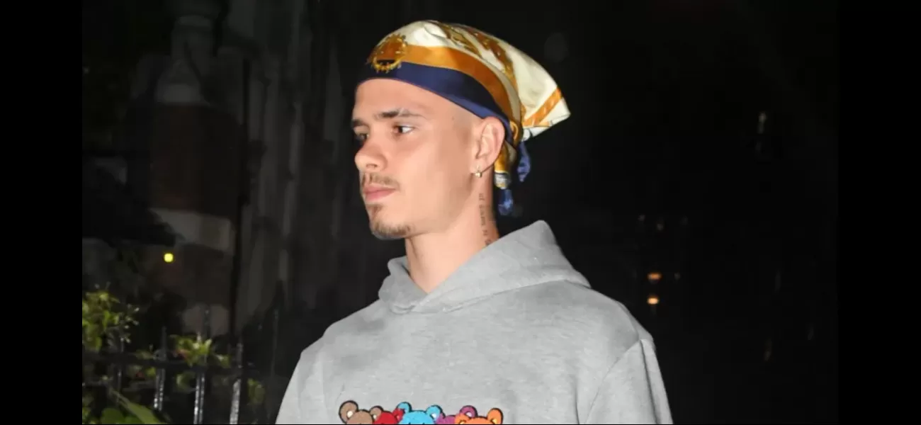 David Beckham's son Romeo, 21, looks just like his famous father as he wears his iconic bandana.