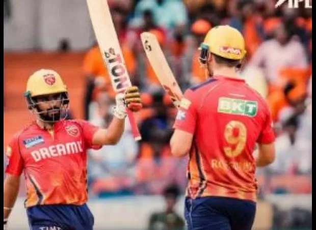 Prabhsimran leads PBKS to a score of 214/5 versus SRH in IPL game.