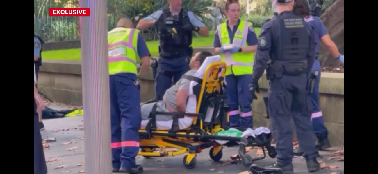 A man accused of stabbing a police officer in Sydney has been arrested and charged.