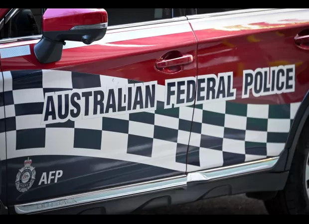 Man to appear in court for attempting to open plane door during flight.