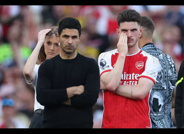 Arsenal's losses in certain games prevented them from winning the Premier League.