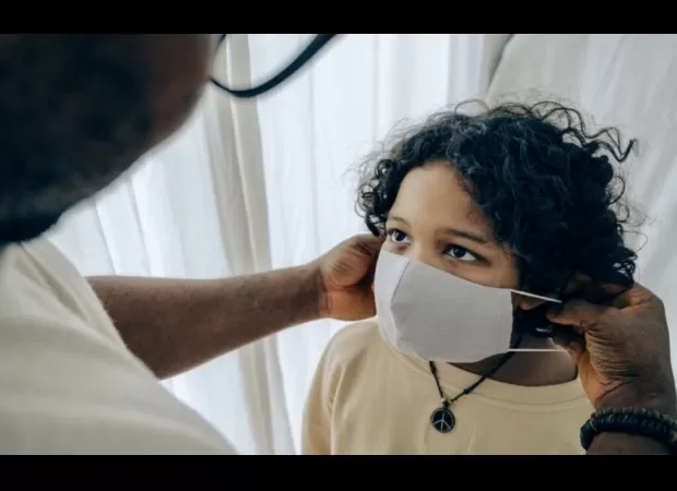 North Carolina Senate brings back outdated law from 1950s, forbidding masks in public despite health worries.