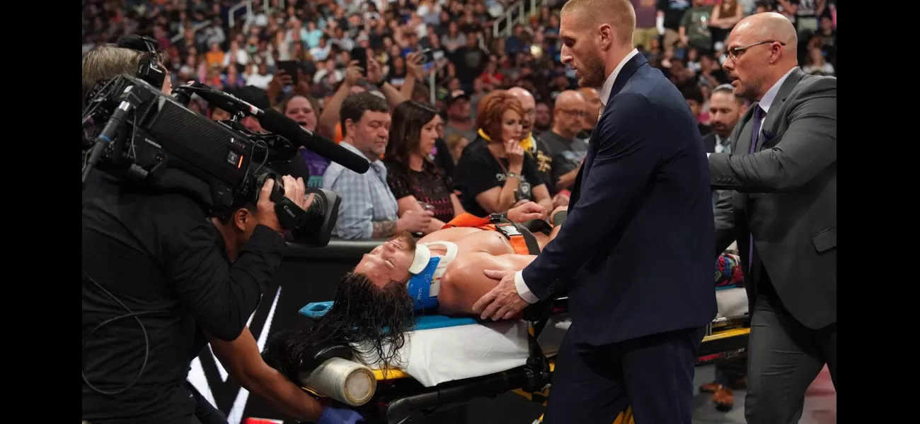 A WWE wrestler was taken out of the arena on a stretcher and placed in an ambulance after a intense match.