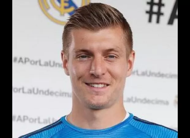 Famous footballer Toni Kroos announces retirement following 2024 Euros tournament.