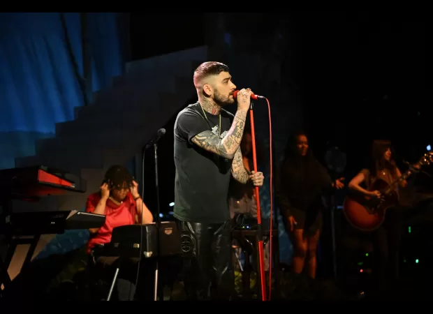 Zayn Malik's debut solo concert was short, but his fans didn't mind.