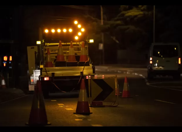 A roadworker in Brisbane was hurt after being struck by a hit-and-run driver at midnight.