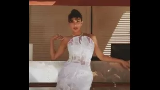 Jacqueline Fernandez shares a photo of herself wearing a white strapless dress that hits at the knees, delighting her fans.