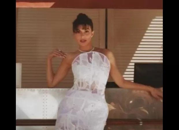 Jacqueline Fernandez shares a photo of herself wearing a white strapless dress that hits at the knees, delighting her fans.