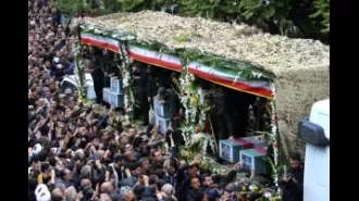 Iran lays to rest former leader and top diplomat who died in a helicopter accident.
