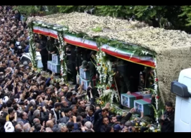 Iran lays to rest former leader and top diplomat who died in a helicopter accident.
