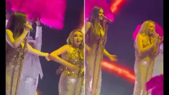 Nadine Coyle steps in to sing for Cheryl on Girls Aloud tour, creating a heartwarming moment.