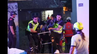 Four people died when a building collapsed while partygoers were dancing on a Spanish island.
