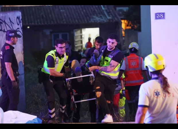Four people died when a building collapsed while partygoers were dancing on a Spanish island.