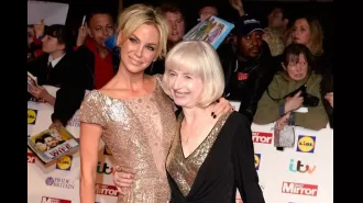 Sarah Harding's mother, Marie, seen smiling with joy after an emotional performance by Girls Aloud.