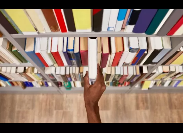 Librarian fights book bans through social media and promoting love for libraries.