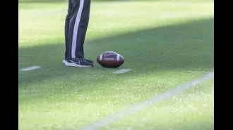 High school football players learn about HBCU programs at a football camp.