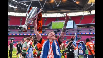 What is the prize for winning the Championship play-off final and moving up to the Premier League?