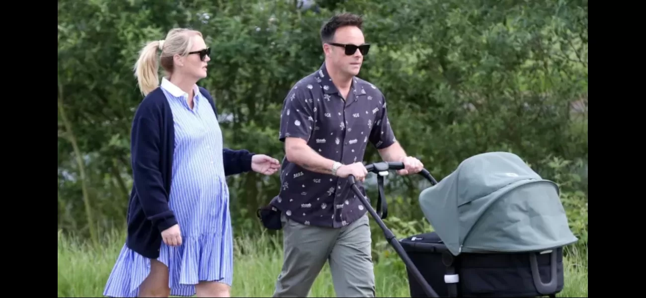 Ant McPartlin, a devoted father, takes his new baby for a walk with his wife Anne-Marie Corbett.