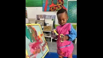 A toddler from Ghana becomes the youngest male artist in Guinness World Records, with his paintings selling quickly.